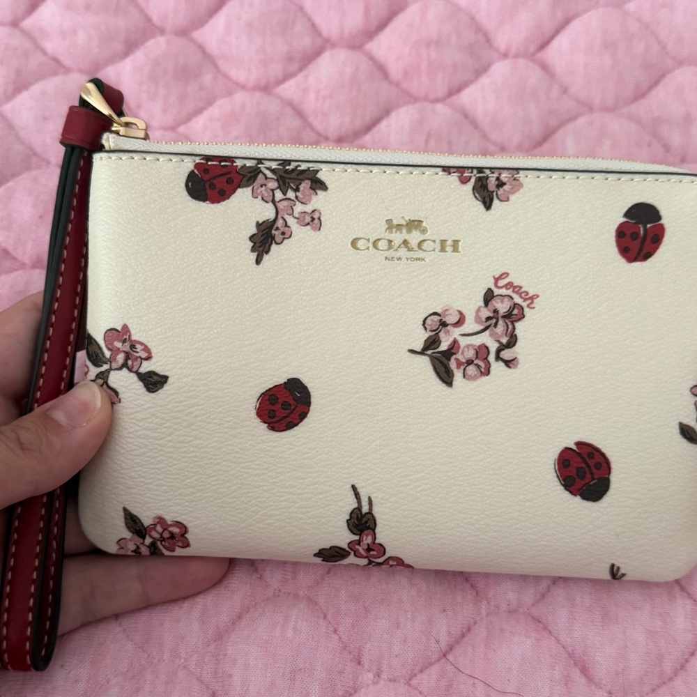 Coach Cream Floral and Ladybug Wristlet